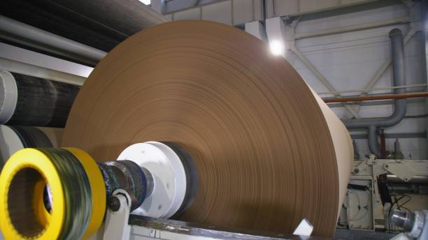 istock mechanism reels packaging paper on huge roll at plant 1370640965