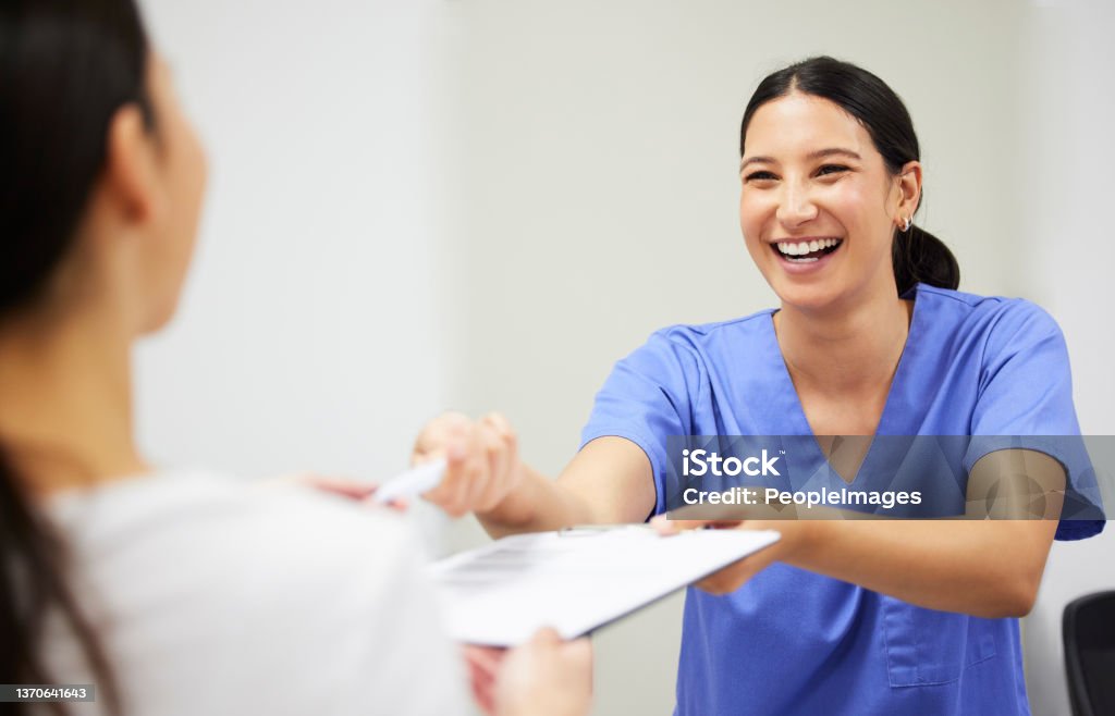 Shot of a patient and assistant interacting in a dentist office I  was created to create beautiful smiles Nurse Stock Photo