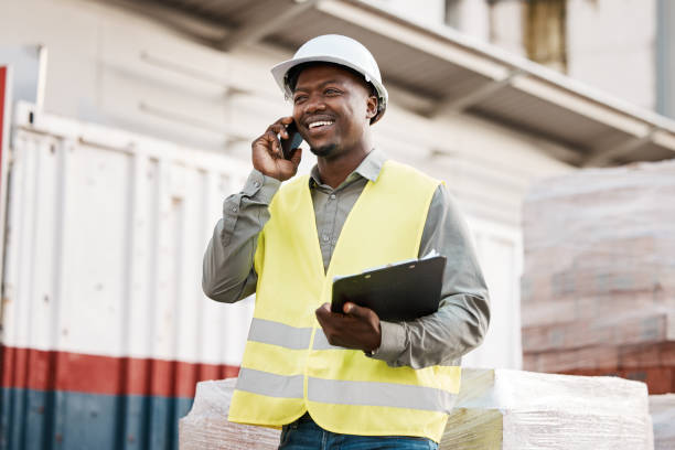 istock Shot of a young businessman using his smartphone while on a construction site 1370644113