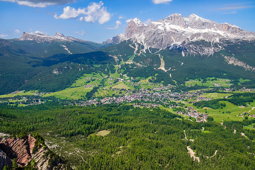 The town of Cortina d’Ampezzo with in background the mountain group of Tofane, Dolomites