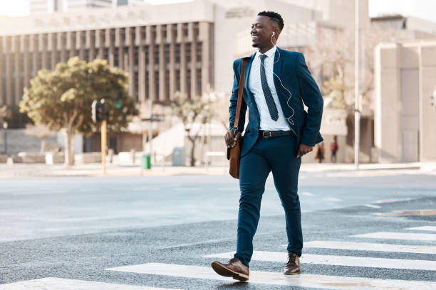 Shot of a young businessman making his way to work
