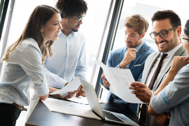 istock Group of multiethnic business people working at busy modern office 1370645351