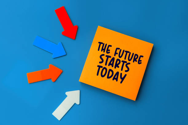 istock The future starts today - concept of text on sticky note. Orange square sticky note and colorful arrows on blue background, top view 1370646459