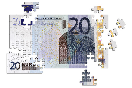 3D illustration. Twenty euro puzzle on white background.
