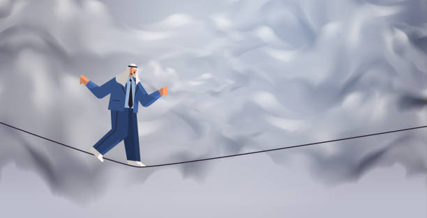istock arab businessman walking on balancing tight rope risk challenge help in business concept 1370650824