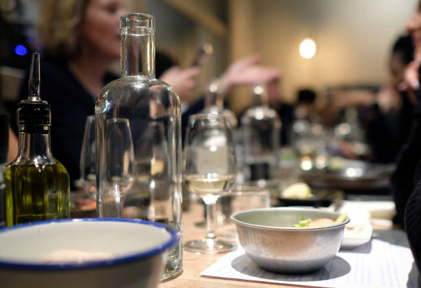 People enjoying dinner in a restaurant stock photo