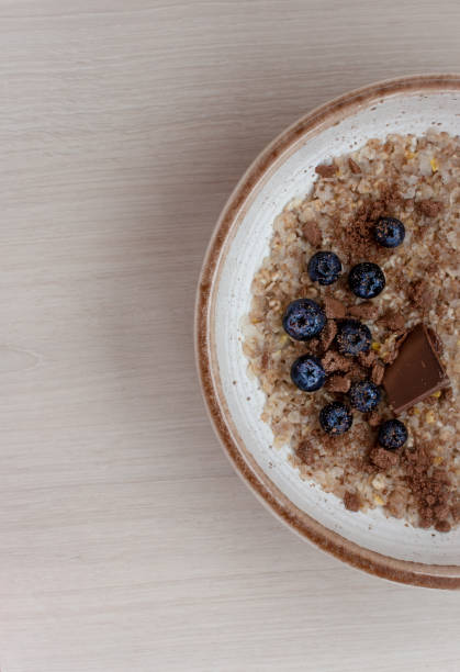 istock cereal porridge with blueberries and chocolate for breakfast 1370652875