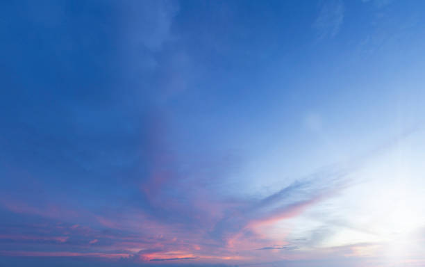istock Summer Blue Sky and white clouds background. Beautiful clear cloudy in sunlight sunset season. Panorama vivid pink cloudscape in nature environment. Outdoor horizon skyline with spring sunshine. 1370657436