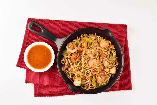 chicken chowmein served with sauce stock photo