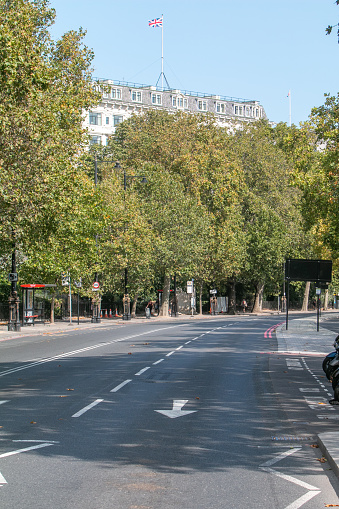 Savoy Hotel on The Strand in City of Westminster, London. People can be seen in the distance.