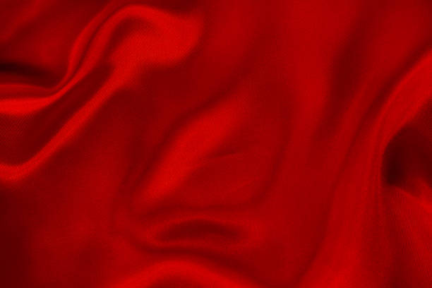 istock Dark red fabric texture background, detail of silk or linen pattern. 1370665735