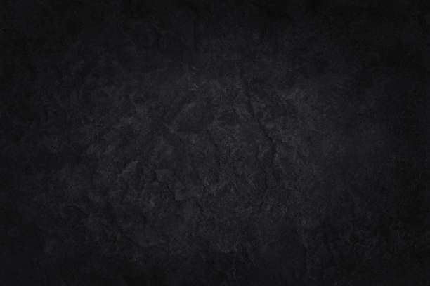 istock Dark gray black slate stone wall texture background in natural pattern for decorative interior and exterior. 1370665851