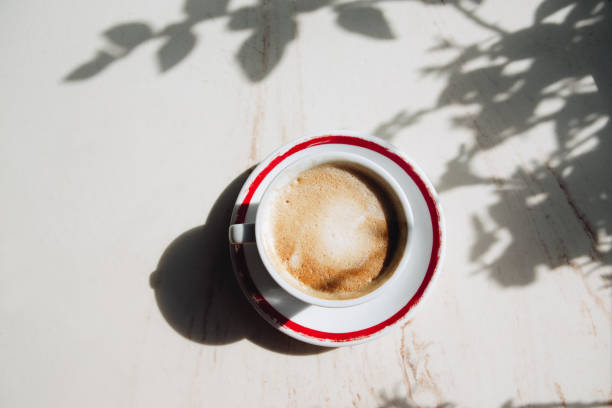 istock cup of coffee, photo with shadow 1370665855