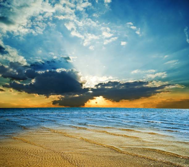 istock sunset at the sea 1370666384