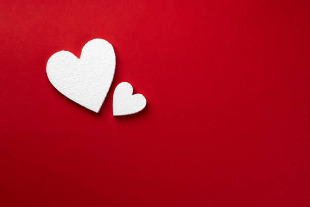 Background With White Styrofoam Hearts On A Red Backdrop Stock Photo -  Download Image Now - iStock