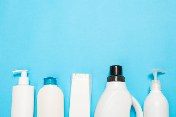 istock cleaning agent on a blue background on the side. Professional cleaning products, general cleaning. Household chemicals top view 1370669526