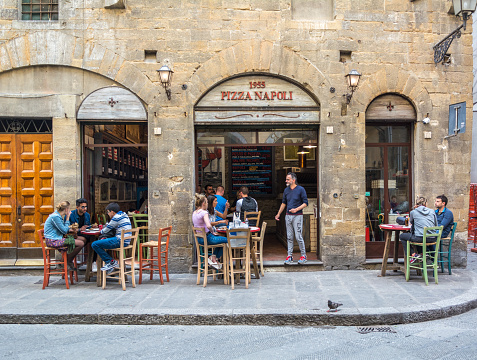 Florence, Italy - MAY 11, 2019: Pizza Napoli 1955 on Via dei Neri