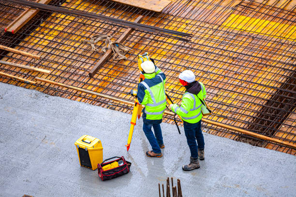 istock Surveyors at the construction site 1370670769