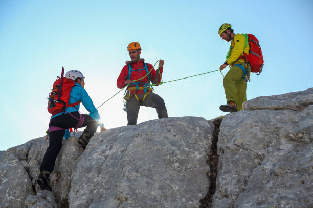 istock Group of mountain climbers on their way to the top 1370670942