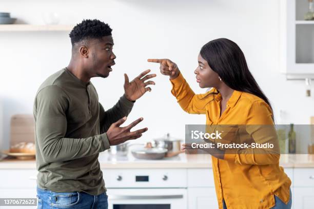 Lovers Fight Portrait Of Andry Black Couple Emotionally Arguing In Kitchen Stock Photo - Download Image Now