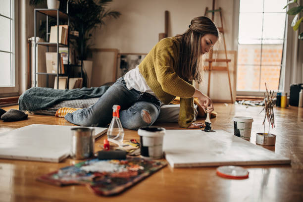 istock Artist painting on the floor 1370672826