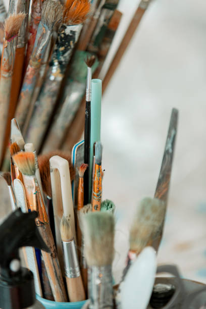 istock Artist restorer's tools, close-up brushes, vertical photo 1370674413