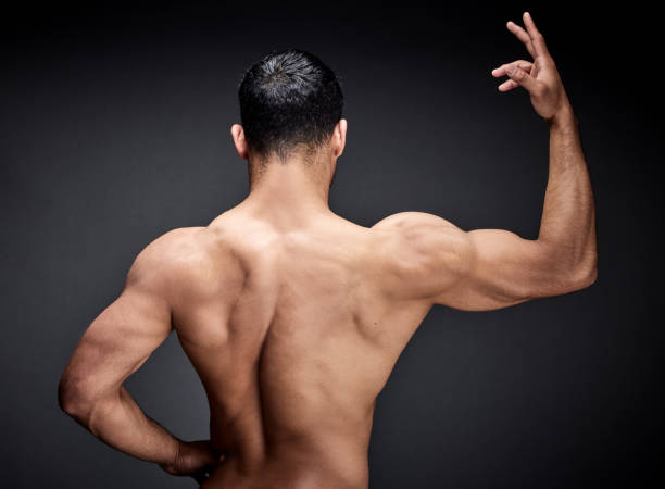 istock Shot of an unrecognisable man standing alone and posing in the studio 1370674721