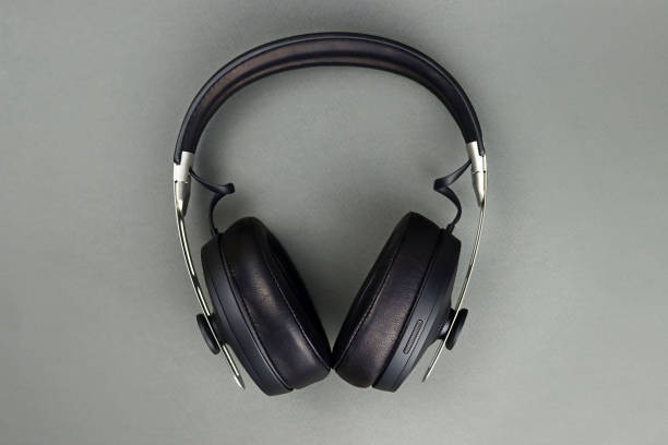 istock Wireless headphones with leather ear pads on a gray background 1370675258