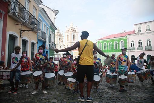 salvador, bahia, brazil - january 25, 2022: members of a percussion band are seen during a performance at Pelourinho in the city of Salvador.