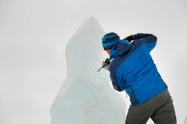 istock Portrait of a sculptor at work on a figure 1370677597