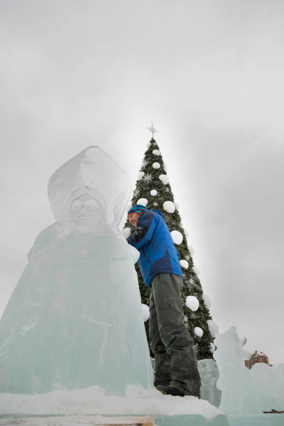 istock Portrait of a sculptor with a chisel in his hands 1370677673