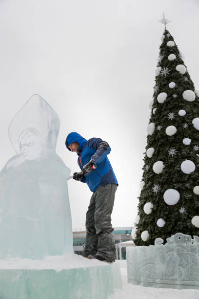 istock Portrait of a sculptor with a chisel in his hands 1370678655