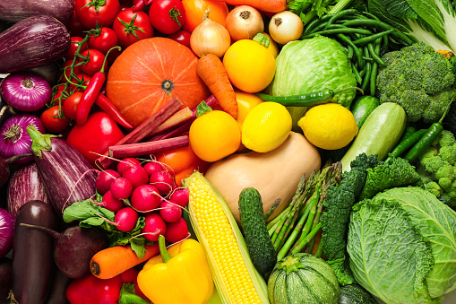 Many fresh vegetables as background, top view