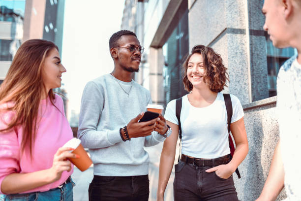 istock Coffee Time For Multiethnic Friends Outside 1370680008