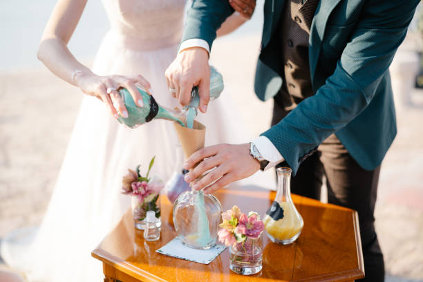 istock Midsection Of Bride And Groom Preparing Food 1370680659