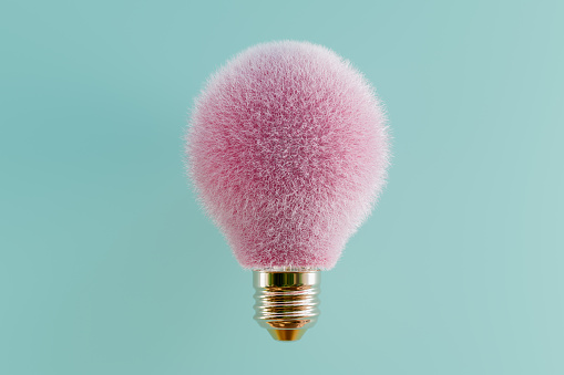 Light bulb with pink hair against turquoise backdrop conceptual 3D illustration