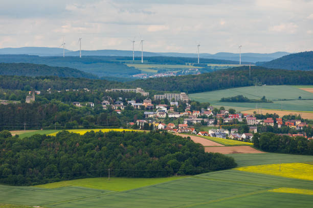 istock Windmill in rural landscape 1370689413