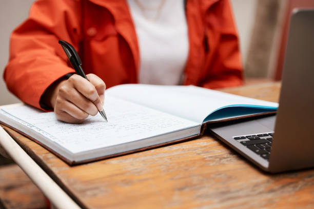istock Shot of an unrecognizable student studying at college 1370692060