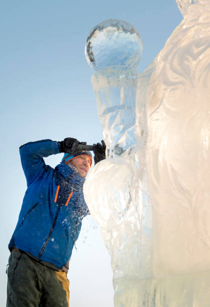 istock Portrait of a sculptor at work on a figure 1370693373