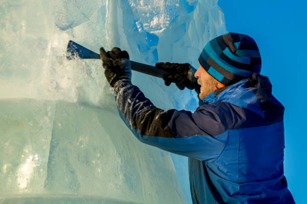 istock Portrait of a sculptor at work on a figure 1370694124