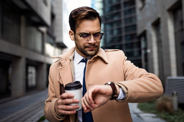 istock Businessman getting late on a way to work 1370695606