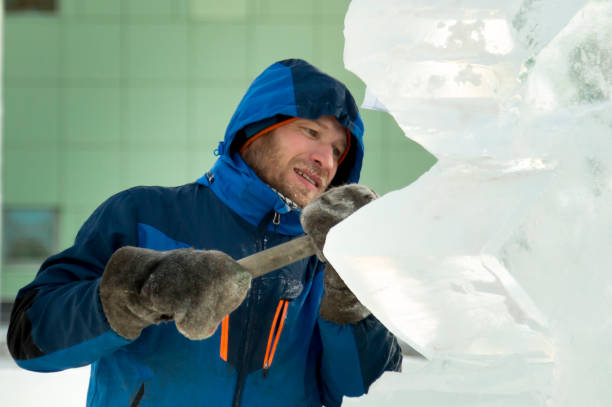 istock Portrait of a sculptor at work on a figure 1370695662