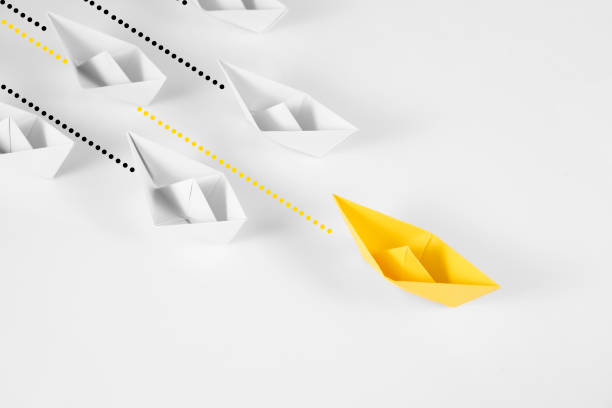 istock Yellow Paper Boat 1370695670