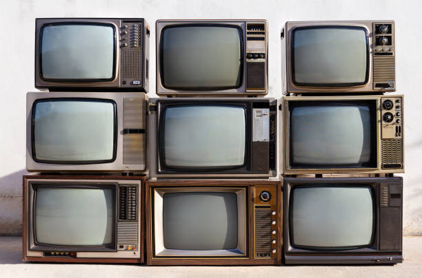 istock Pile retro old television (TV) background 1370696679
