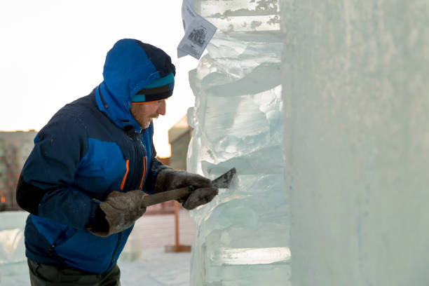 istock Portrait of a sculptor at work on a figure 1370696789