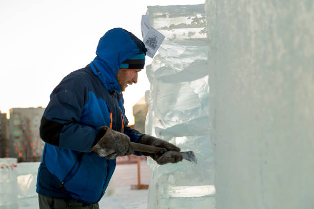 istock Portrait of a sculptor at work on a figure 1370696817