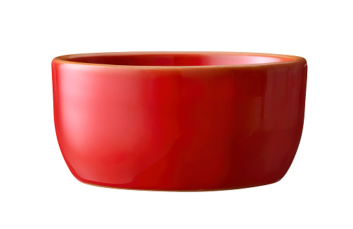 red enamel ceramic baking bowl isolated on white.