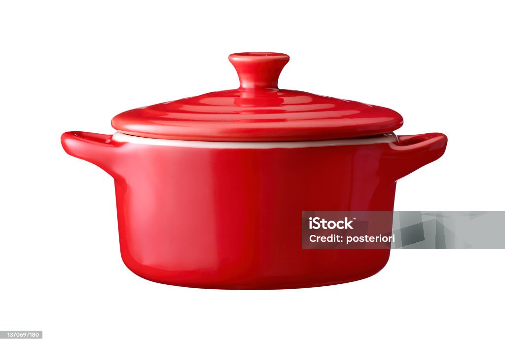 red cast iron enamel frying pan. Dutch oven, isolated on white Cooking Pan Stock Photo