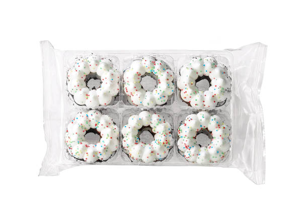 Chistmas wreath cookies in a plastic tray