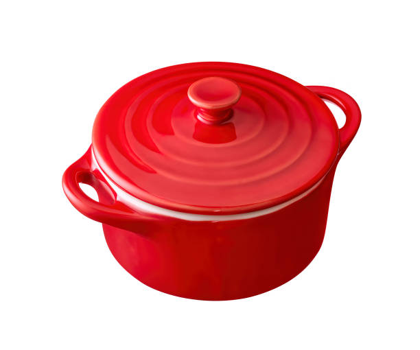 istock red cast iron enamel frying pan. Dutch oven, isolated on white 1370697298
